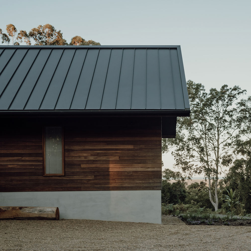 house that provides an intimate connection with the surrounding landscape