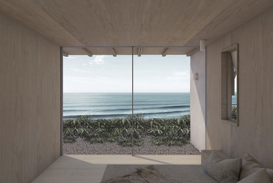floor to ceiling glass sliding doors that have panoramic views out over the ocean.