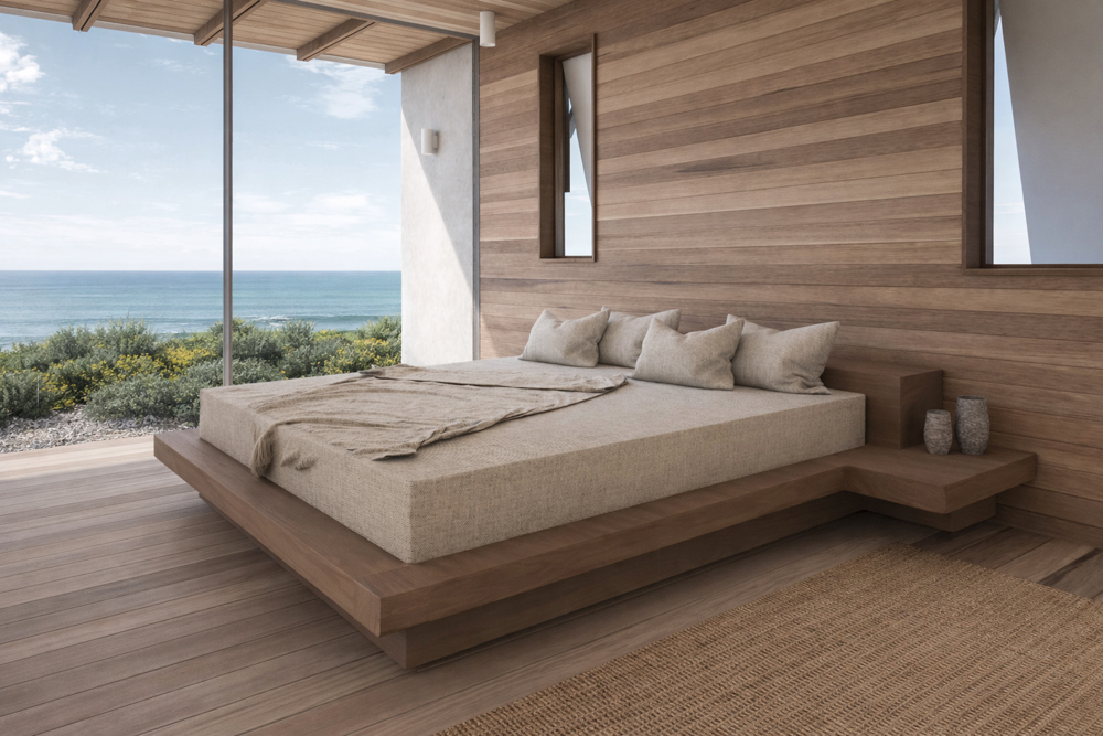 floor to ceiling glass sliding doors that have panoramic views out over the ocean.