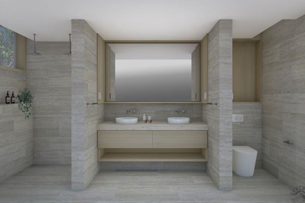 We designed floor-to-ceiling glass sliding<br />
doors that have uninterrupted views of the coastal forest and ocean.