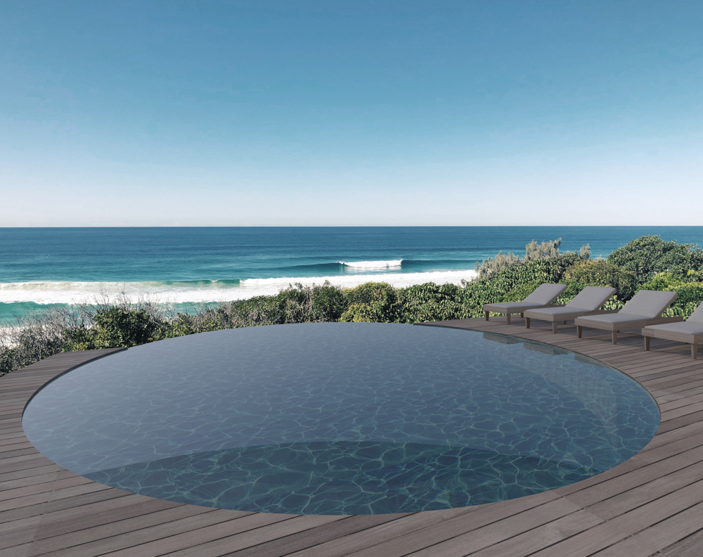 To manage the steep slope, we designed<br />
a series of terraced gardens and outdoor<br />
entertaining areas that step down from the inside.